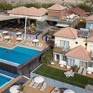 https://caybeach-meloneras.maspalomashotels.com